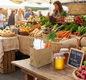 Vented natural brown kraft produce bag at a farmers market stall